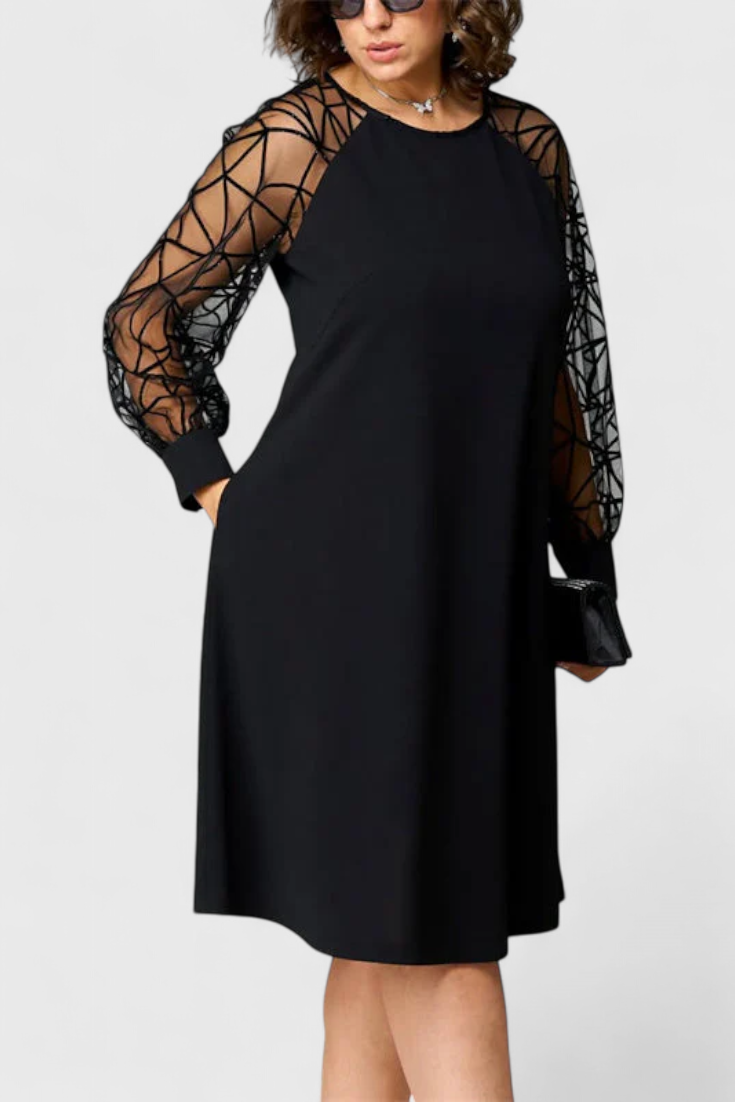 Bellezza Vestido Negro con Mangas de Malla y Corte Holgado